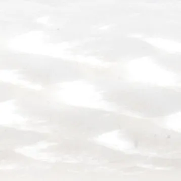 Close-up of white textured material with faint diagonal patterns.
