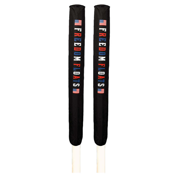 Pair of black trailer guide pads with Freedom Floats logo and American flag design.