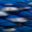 Macro shot of intertwined blue, navy, and gray rope.